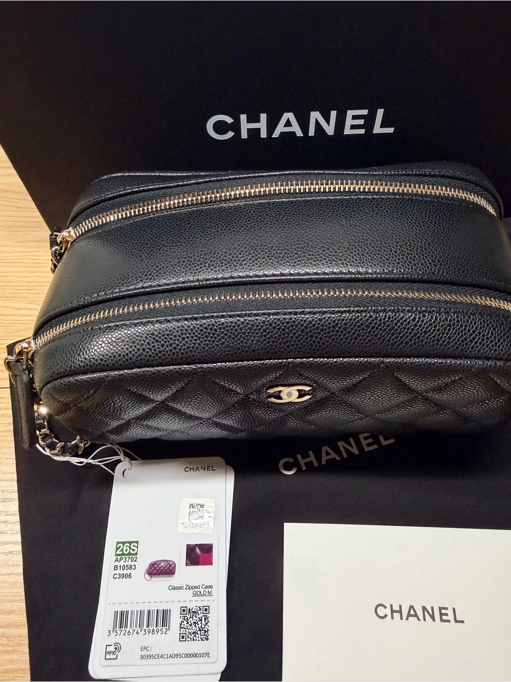 Chanel Black Quilted Caviar Toiletry Case With Chain